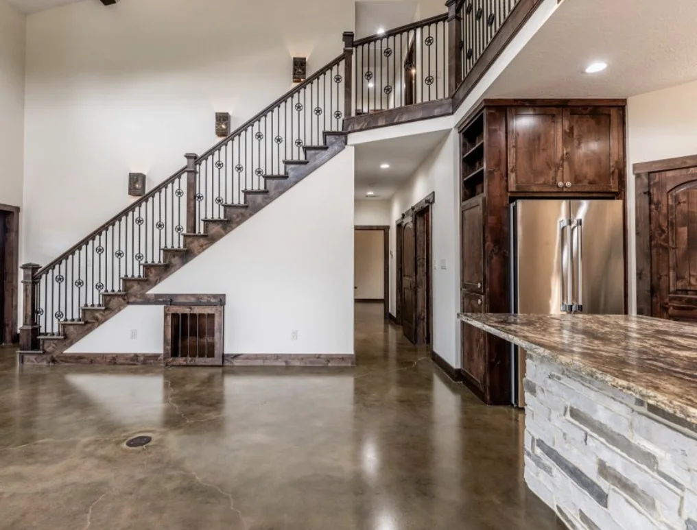 Polished concrete floor across a residential open-plan interior