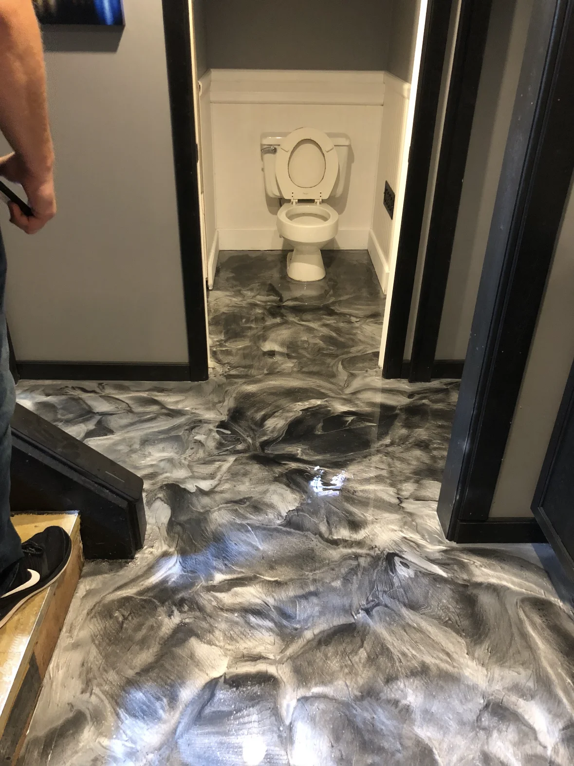 Silver and black metallic finish through a hallway