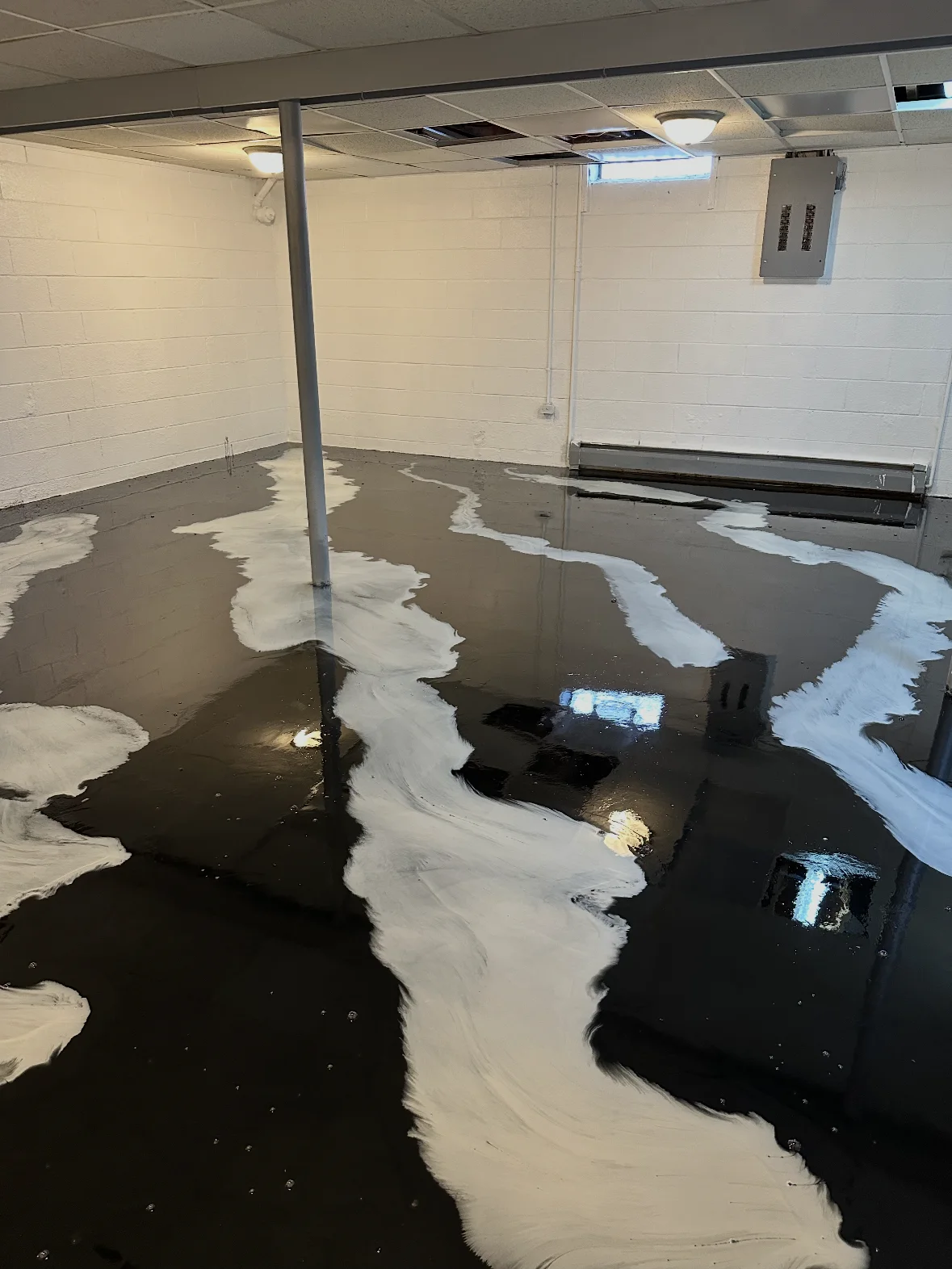 High-contrast black and white metallic interior floor
