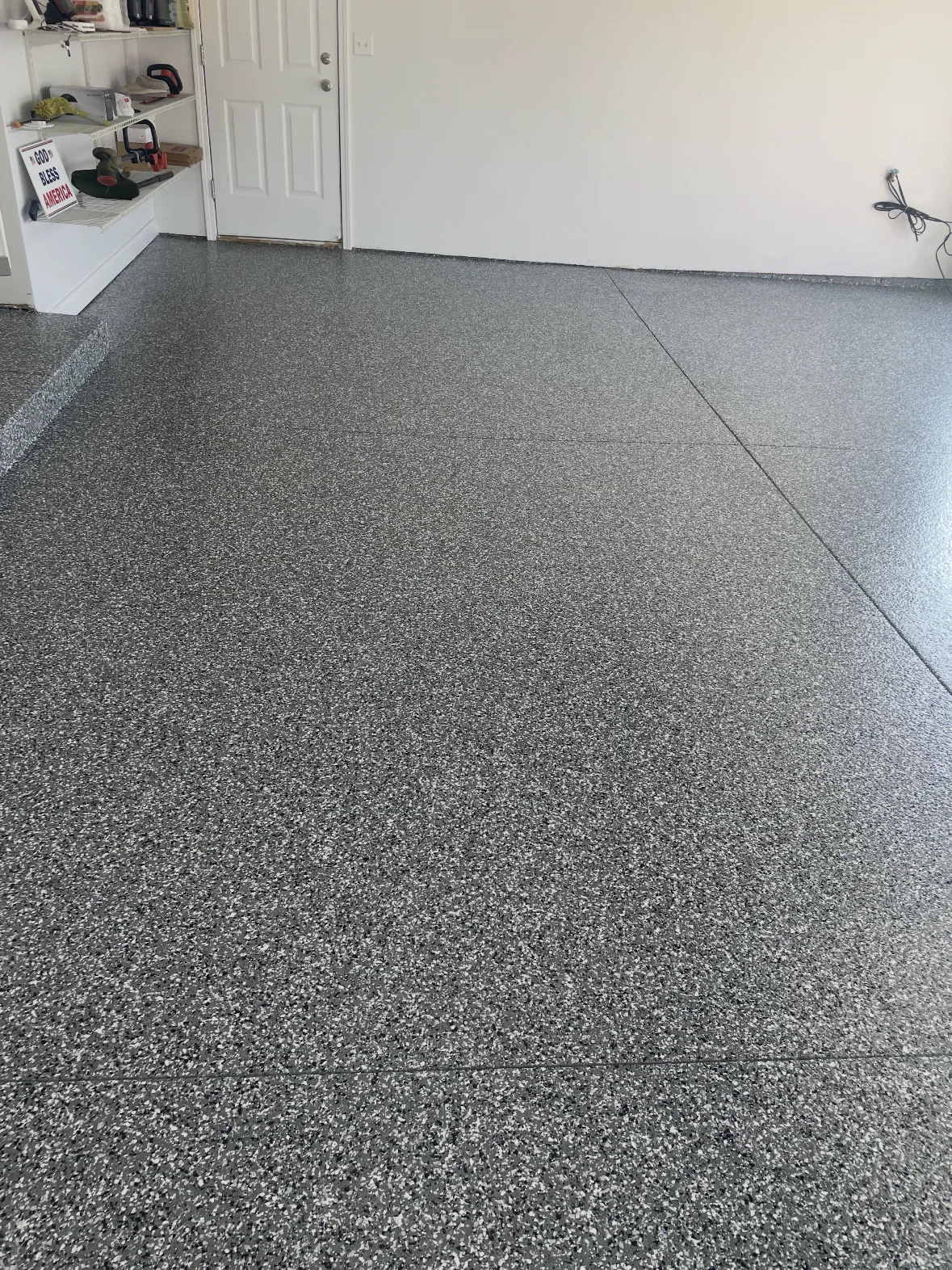 Gray flake epoxy garage floor at a home