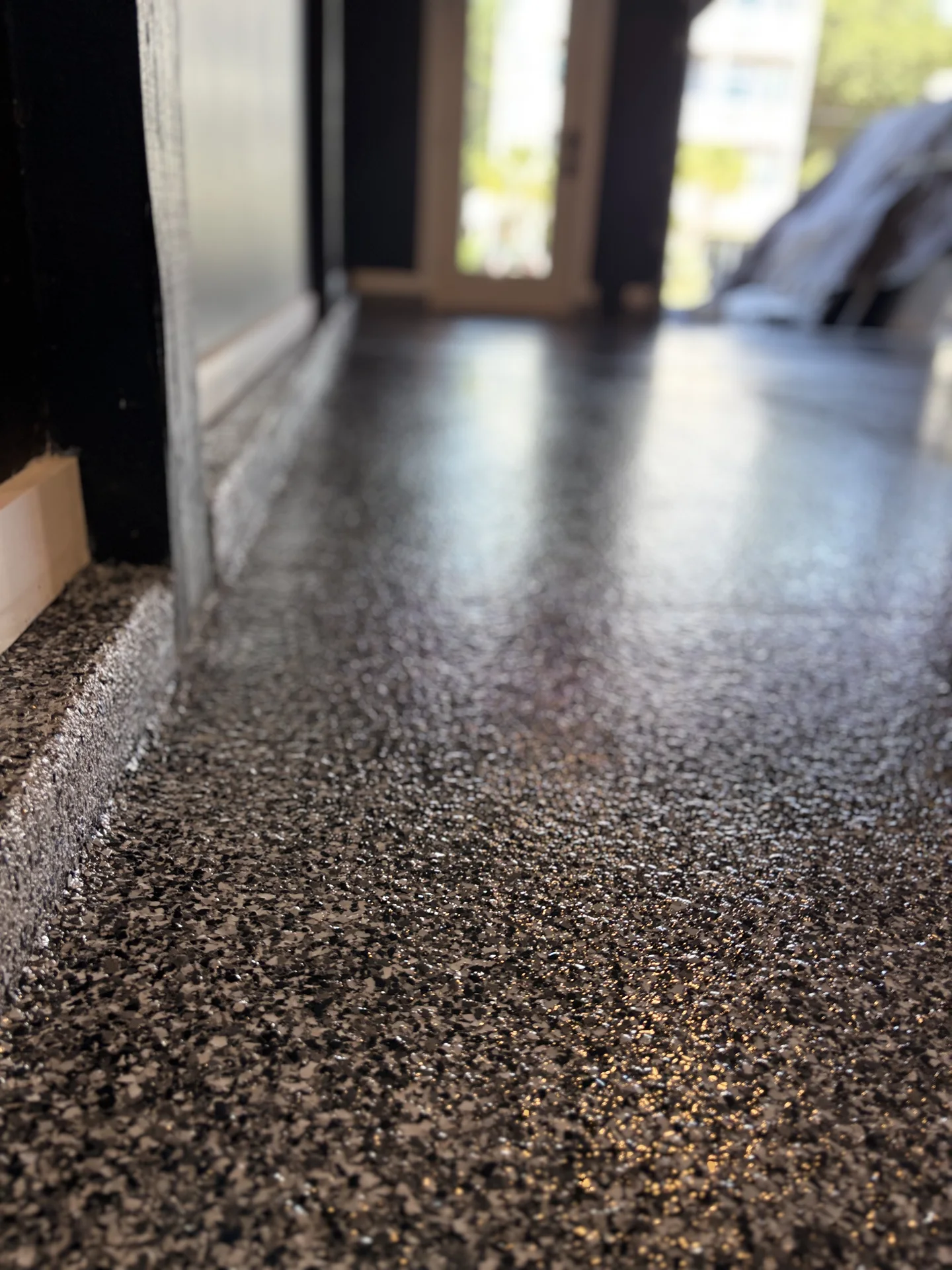 Brown and charcoal flake finish in a residential garage
